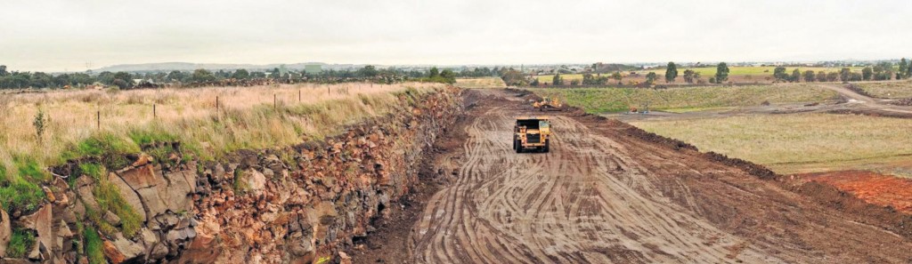SITE PHOTO: Preparing a laminated stockpile of overburden